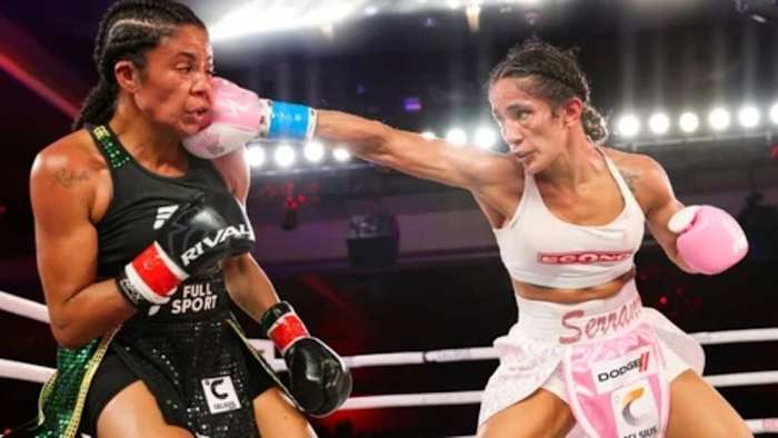 Amanda Serrano punches the face of Danila Ramos during the MVP boxing match. Serrano will square off against Nina Meinke on Saturday, March 2, in the historic Coliseo de Puerto Rico in San Juan, Puerto Rico. ALEX MENENDEZ/GETTY IMAGES.
